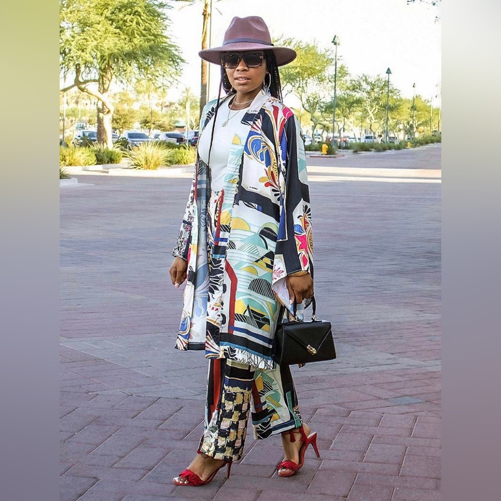 Add some bold prints to your wardrobe with this two-piece Kimono and Pants set!